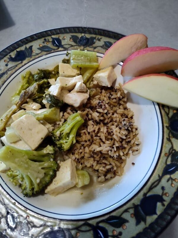 Thai tofu and chicken green curry dish plated