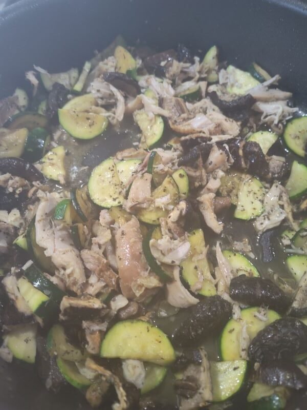 Add the zucchini and mushrooms, sauté and combine the ingredients in the skillet