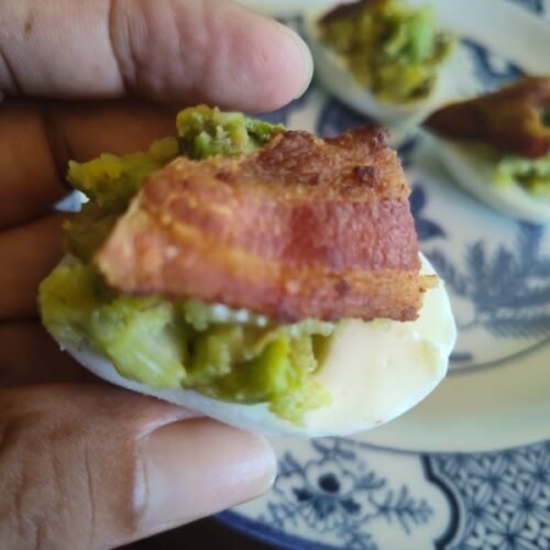 I love this dish for a nice snack or side dish. These deviled eggs low carb are my favorite go to dish even at parties. To make mine a little healthier but a touch more elegant I add some bacon and capers to the dish to make it even more tasty and the bacon is totally like eye candy on top of each dish.